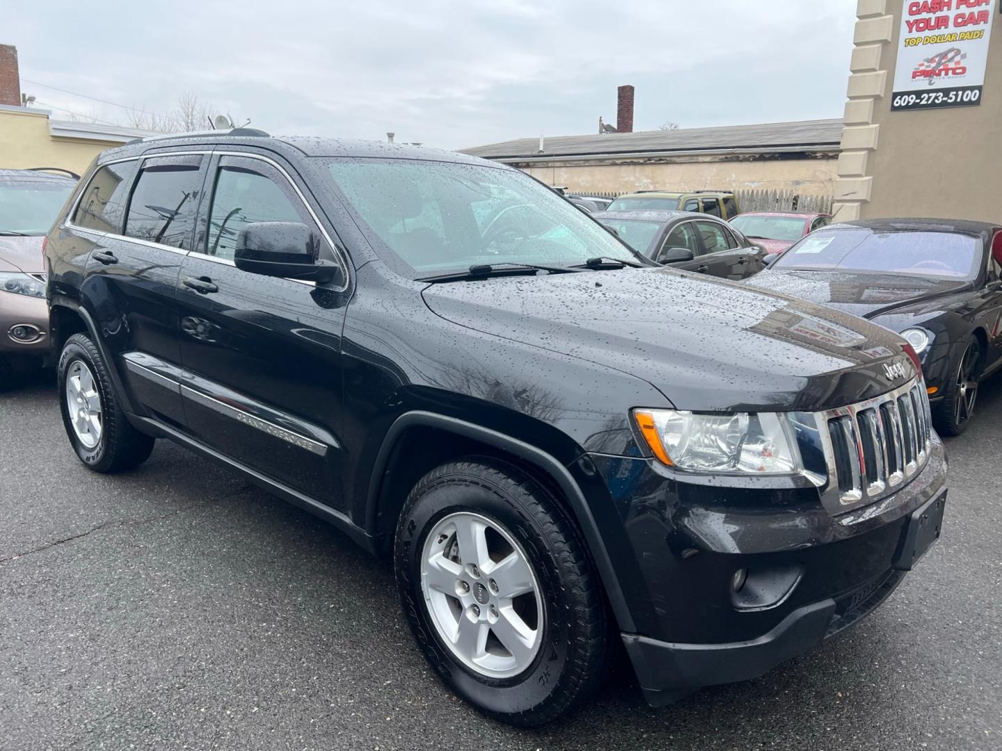 2013 BLACK /beige Jeep Grand Cherokee Laredo 4wd (1C4RJFAG4DC) with an 3.6L V6 DOHC 24V GAS engine, 5 Speed Automatic transmission, located at 1018 Brunswick Ave, Trenton, NJ, 08638, (609) 989-0900, 40.240086, -74.748085 - Photo#1